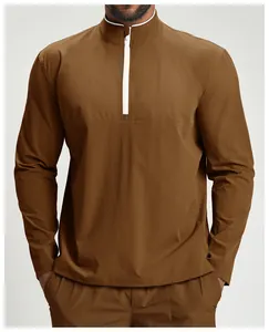 Men's eco-friendly recycled brown sports jacket with half-zip and long sleeves.
