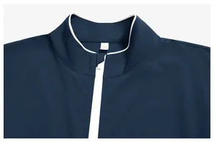 Detailed view of dark blue recycled sport jacket neckline with zipper and size label