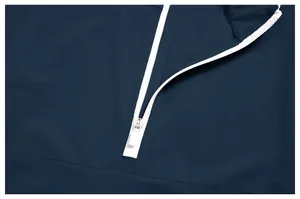 Close-up of white contrast zipper on a navy blue recycled quick-dry athletic jacket.
