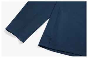 Detailed macro view of quick-dry athletic jacket cuff and side split hem stitching