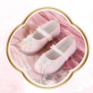 Pink Hanfu shoes for girls with embroidered butterflies and elegant pearl tassel details