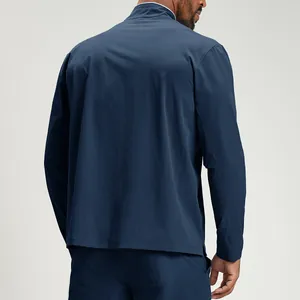 Men's navy blue eco-friendly recycled sports jacket, back view showing fit and texture