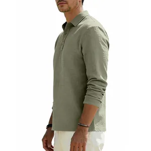 Side view detail of a men's olive green linen long-sleeve polo shirt with buttons.