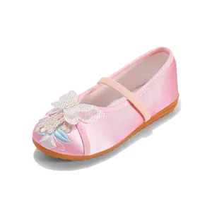 Elegant pink Hanfu embroidered shoes for girls with floral and butterfly pearl detail.