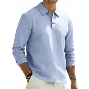Close-up detail of light blue linen fabric on men's long sleeve polo shirt for business casual
