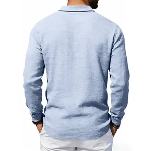 Back view of light blue linen long-sleeve polo shirt featuring a dark collar trim detail