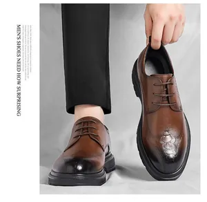 Detailed macro view of brown men's leather shoes with stylish crocodile pattern embossing
