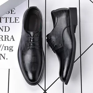 Elegant black lace-up business dress shoes for men featuring a crocodile leather texture