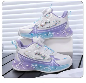 Close-up of girl's purple heart-themed sneakers with LED lights and rotary dial