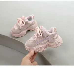 Detail shot of a pink breathable sneaker for children featuring a soft chunky sole
