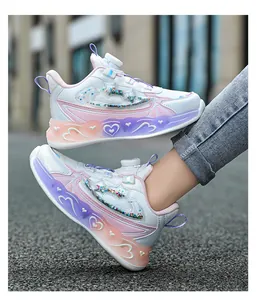 Close-up of girl's white sneakers showing the rotating buckle and gradient LED sole