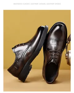 Close-up of premium dark brown brogue leather shoes with crocodile-embossed texture