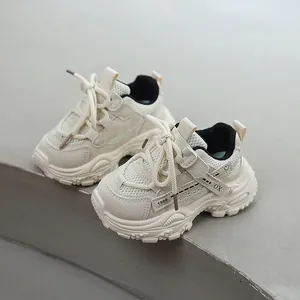 Stylish off-white children's chunky sports sneakers with breathable mesh and soft soles