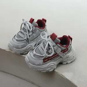 Breathable children's sneakers in grey and burgundy with soft thick soles and mesh
