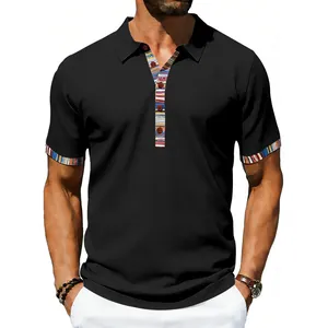 Detail of men's black polo shirt with colorful Navajo pattern on collar and sleeves.