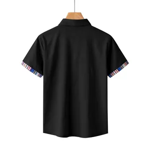 Detailed back view of a black men's short sleeve shirt featuring Navajo stripe cuffs