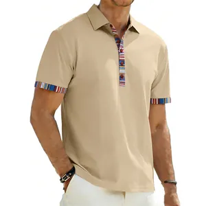 Detail of men's polo shirt featuring colorful striped placket and sleeve cuffs.