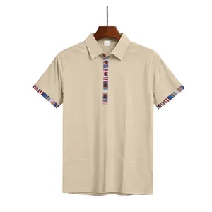 Detail view of a khaki men's polo shirt featuring colorful Navajo patterned trim