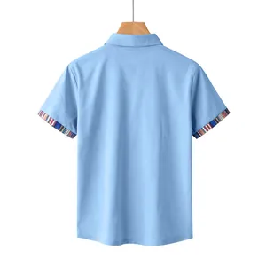 Close-up back view of men's light blue polo shirt with colorful striped sleeve trim.