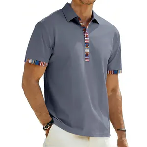 Detailed view of grey men's Polo shirt with colorful Navajo stripe trim on cuffs