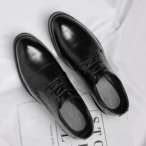 Premium black men's business dress shoes with textured pattern for formal events
