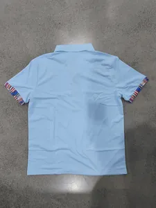 Back view of light blue men's Polo shirt with Navajo striped color block cuffs