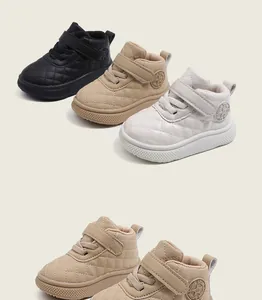 Detailed view of quilted leather toddler sneakers with star logo and velcro strap