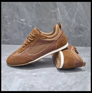 Side view of vintage brown suede German Army Trainer sneakers with soft rubber sole