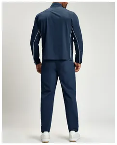 Vue arrière du survêtement de sport bleu marine pour homme avec détails de liseré blanc.