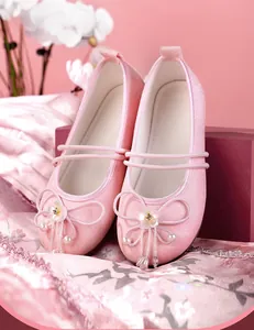 Detailed view of pink breathable Hanfu mesh shoes with delicate floral and pearl ornaments