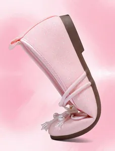 Detail showing the impressive flexibility of the soft sole on this pink mesh girl's shoe
