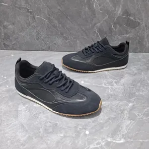 Vintage black German Army Trainer sneakers for couples with soft gum soles and mesh upper