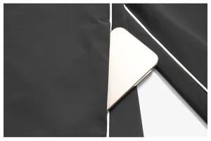 Vue détaillée de la poche latérale d'une veste de sport pour homme à séchage rapide avec liseré