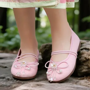Pink traditional Hanfu flats for girls featuring flower beads and glittery mesh detail