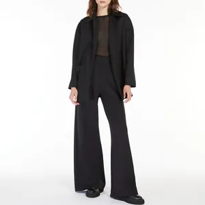 Professional black blazer jacket with high-end resin buttons and matching wide trousers.
