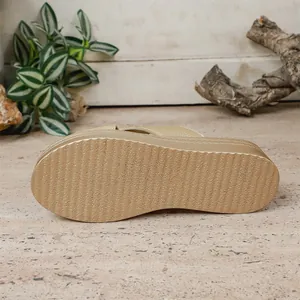 Detailed bottom view of a gold platform sandal featuring anti-slip sole, size 37