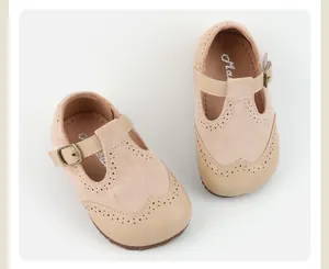 Elegant beige toddler Mary Jane pre-walker shoes with non-slip soft soles and T-strap design