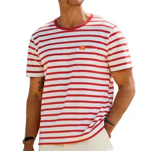 Detail of a men's oversized retro red and white striped crew neck t-shirt with chest pocket.