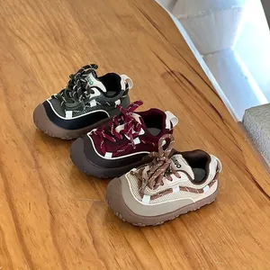 Display of breathable mesh toddler walking shoes in olive green, burgundy, and beige colors.