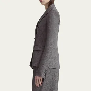 Elegant gray wool blazer featuring high-end Japanese urea buttons on sleeve cuffs