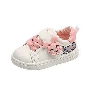 Soft-sole toddler walking shoes with cute pink rabbit and anti-slip white sneakers.