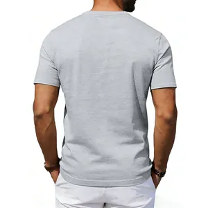 Back view of men's loose grey short sleeve oversize t-shirt showing fabric texture