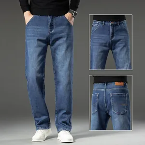 Detail views of men's loose straight-leg denim jeans in blue with a classic five-pocket design