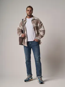 Men's loose straight-leg denim jeans in a classic blue wash, ideal for casual everyday wear