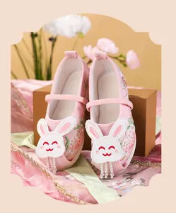 Pink Hanfu embroidered shoes for girls with bunny motif and bead tassels details