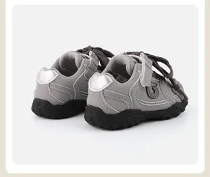 Rear view of grey toddler walking shoes showcasing silver heel detail and durable rubber sole