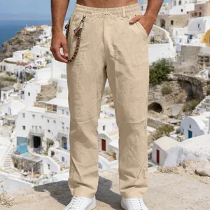 Close-up shot of men's loose linen casual straight-leg pants with a drawstring waist