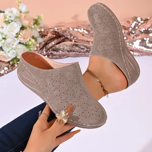 Casual women's platform mules with perforated floral pattern and round toe for summer