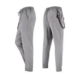 Side and back view of men's loose grey linen casual straight-leg trousers for summer.