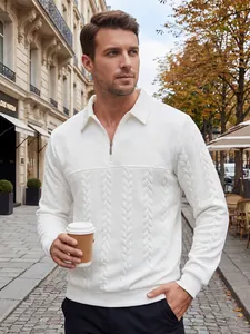 Close-up of white jacquard knit polo sweater with half-zip collar worn by male model